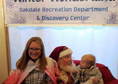 Santa Dan Picture With Infant & Pre-Teen at The Oakdale Winter Wonderland