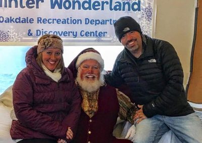 Santa Dan Picture With Parents at The Oakdale Winter Wonderland