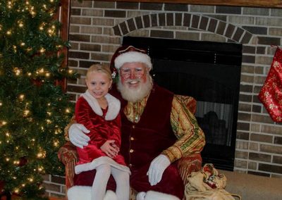 Santa Dan & Little Lady Smiling For The Camera