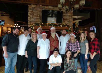 Santa Dan Group Photo With Restaurant Employees